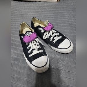 Converse with a purple flap